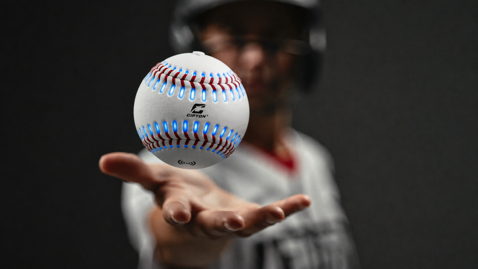 Player holding the glowing CIPTON LED baseball above an open palm