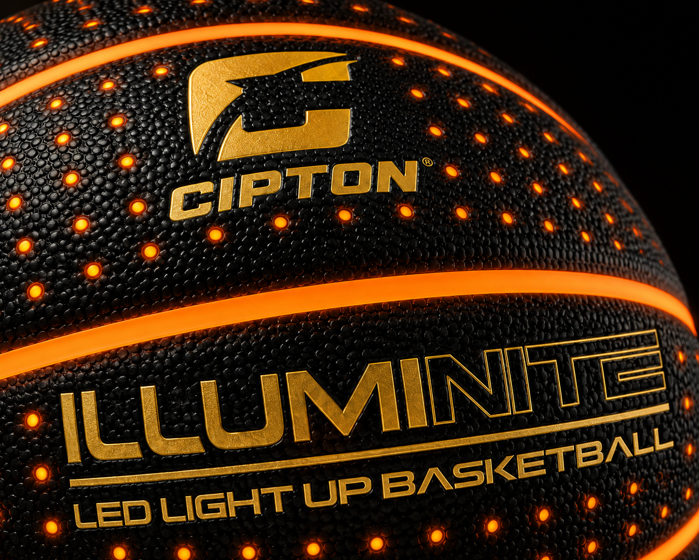 Close-up of impact-activated LED dots and glowing channels on the Illuminite basketball