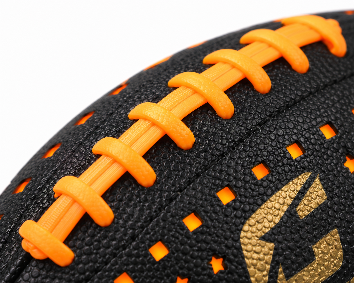 Close-up of the orange laces and glowing dots on the CIPTON LED football
