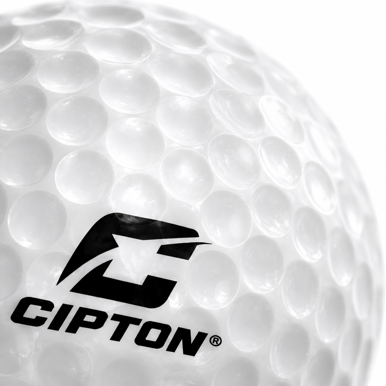 Close-up of the CIPTON logo on a dimpled LED golf ball