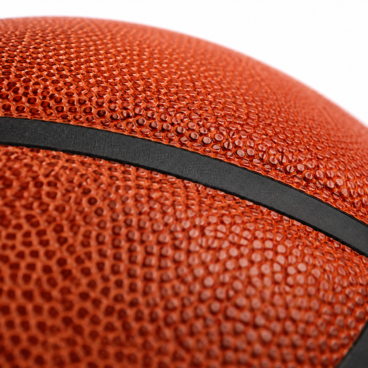 Close-up of the pebbled composite cover and channels on the Elite Pro basketball