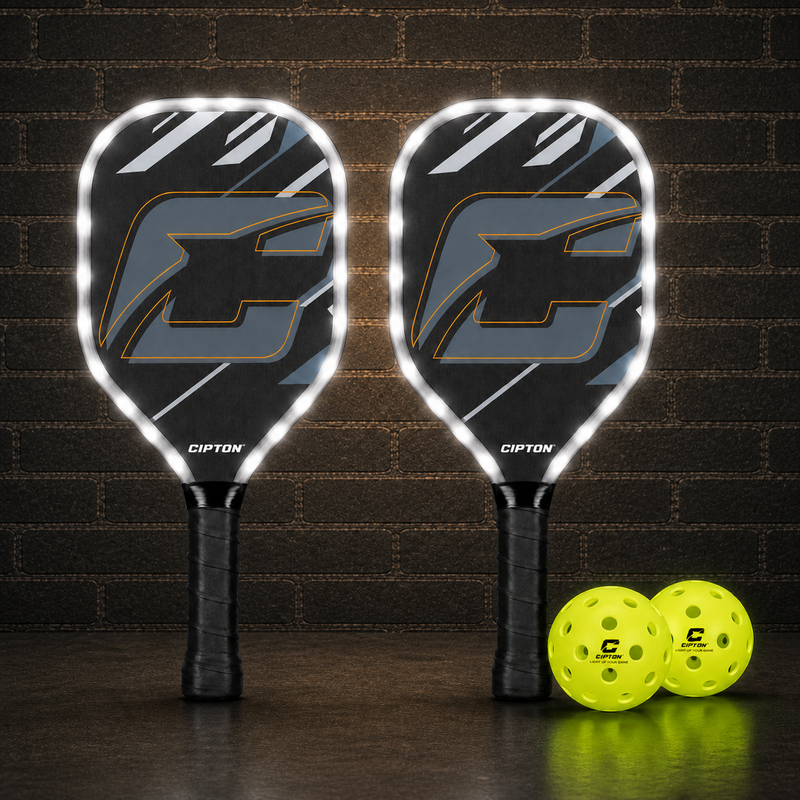 Two CIPTON LED pickleball paddles with lit edges beside two yellow pickleballs