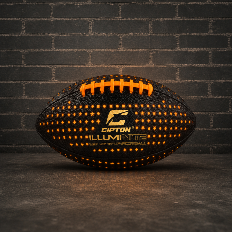 CIPTON Illuminite LED football glowing orange against a brick wall