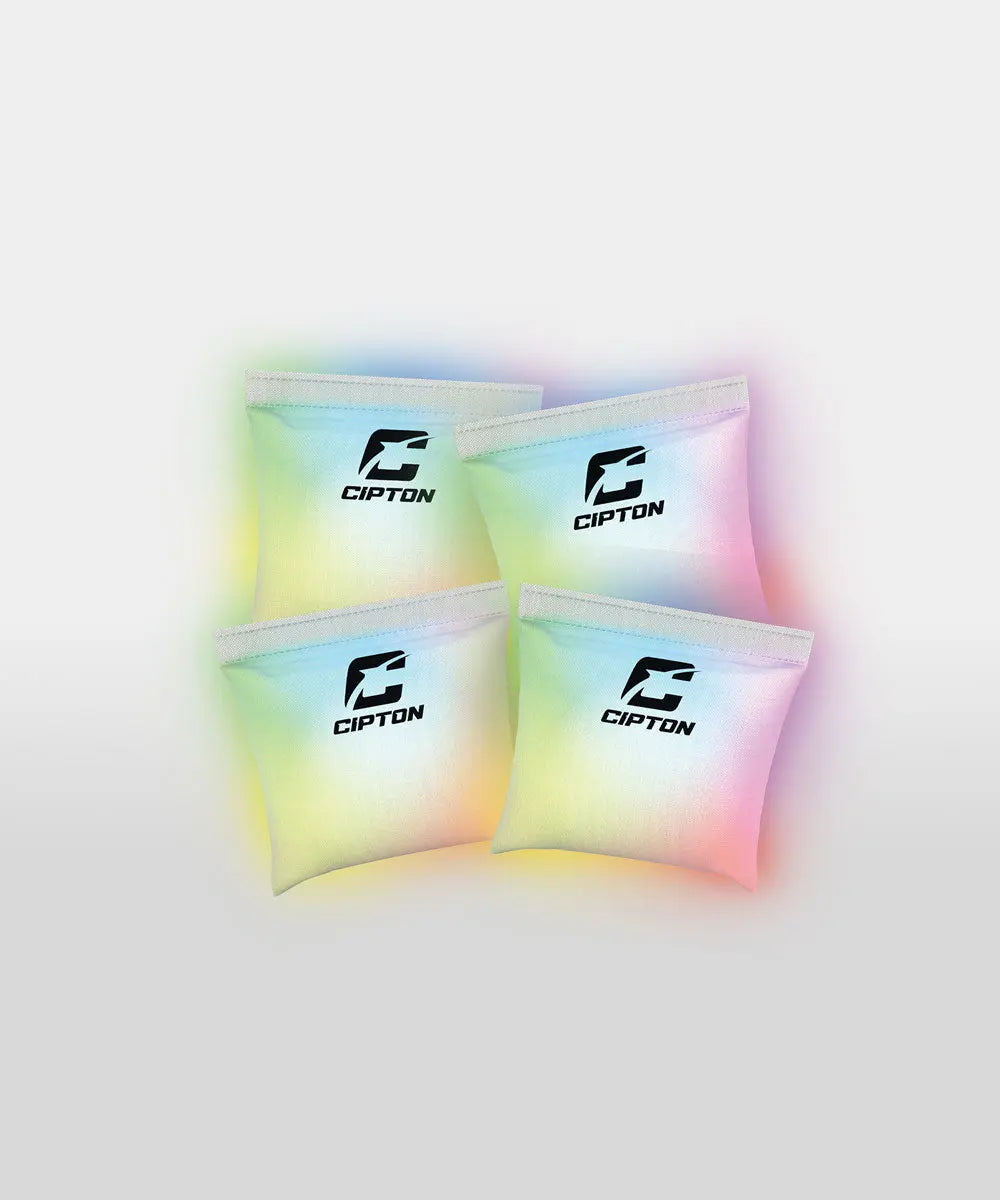 Four colorful Cornhole bags that glows in the night with Cipton logo.